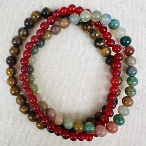Grounding crystal bracelets. Tigers eye, fluorite and carnelian. Moon cleansed.